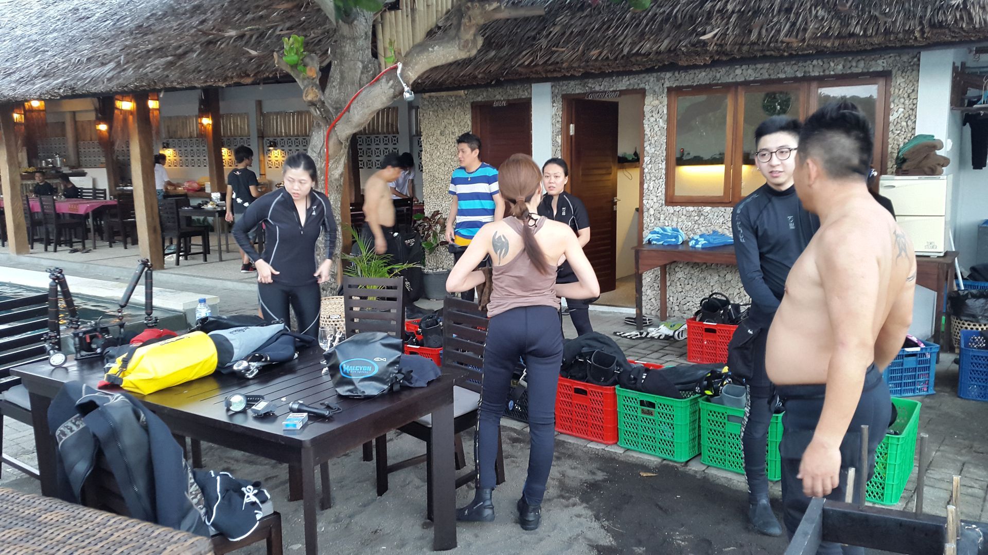 A group of people are standing in front of a building.