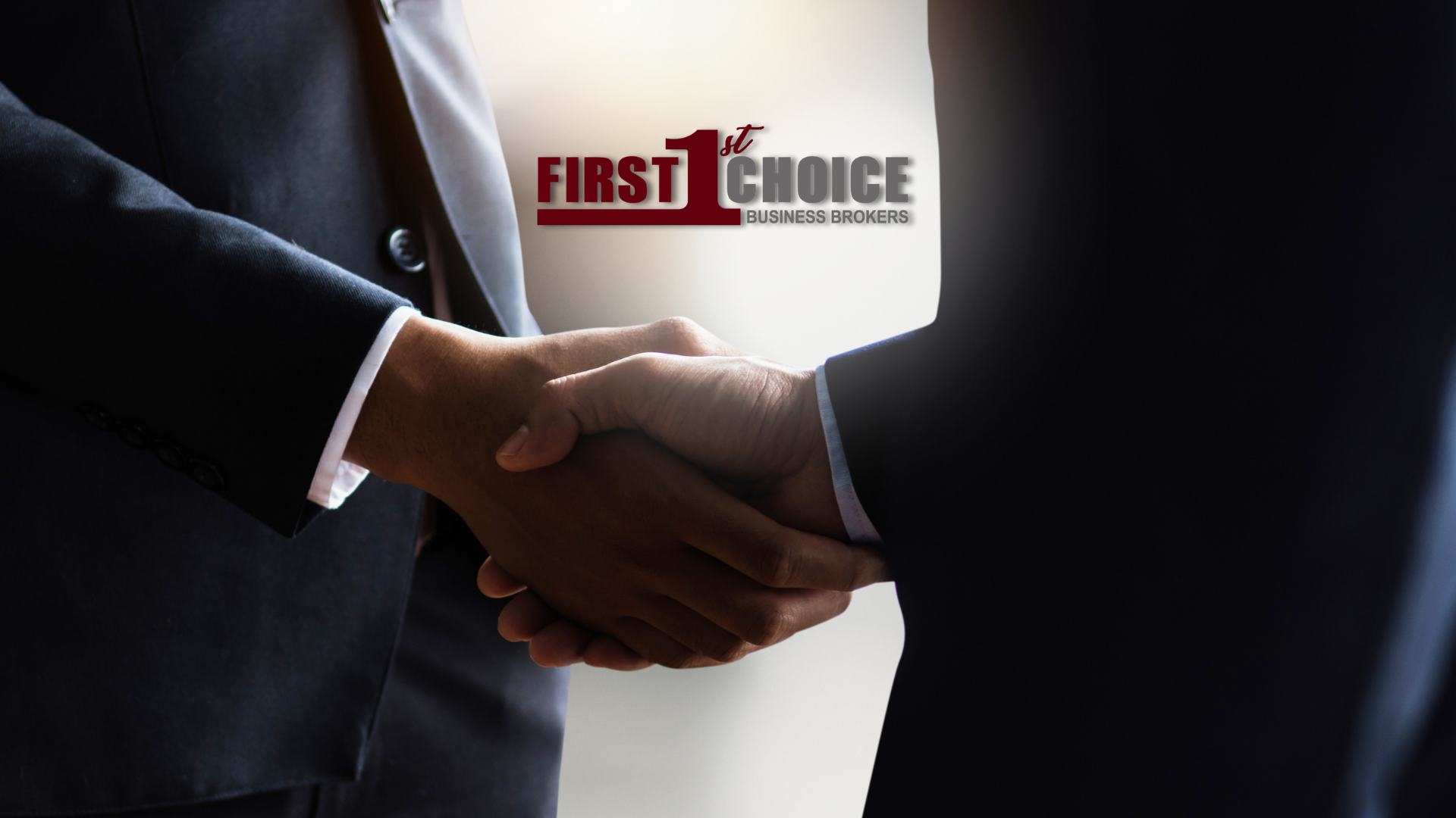 Two men shaking hands in front of a sign that says first choice