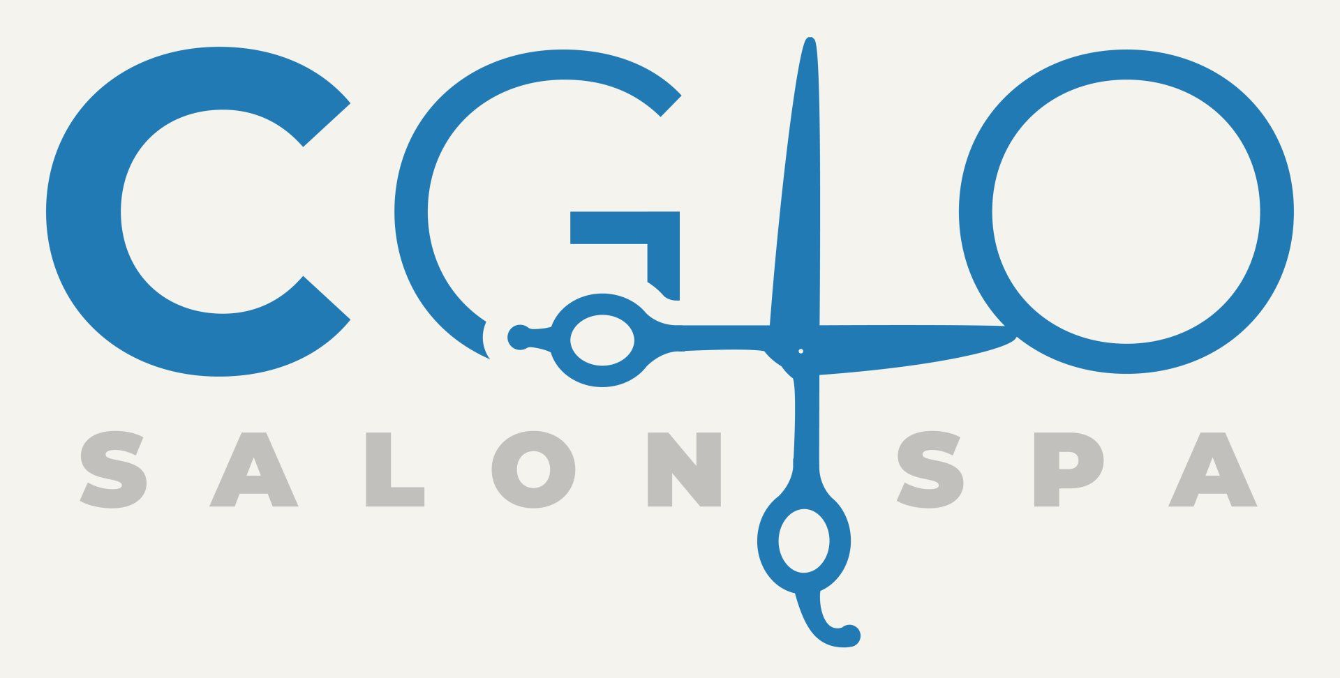 A logo for a salon spa with a pair of scissors.