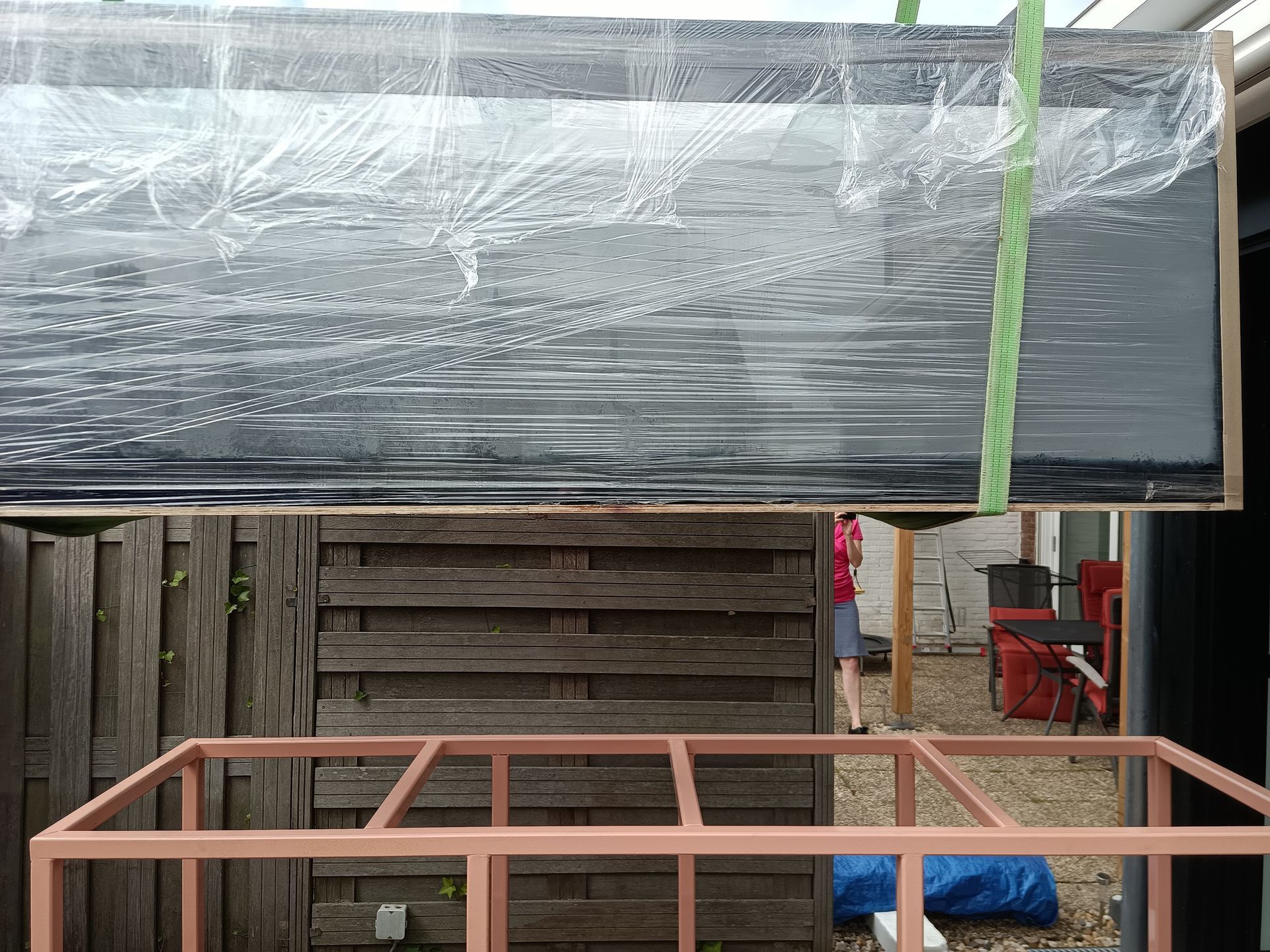 Aquarium over hekwerk laten tillen