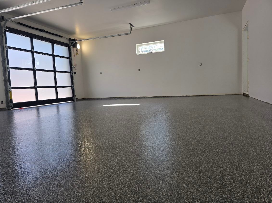 A man is installing an air conditioner on the side of a building.