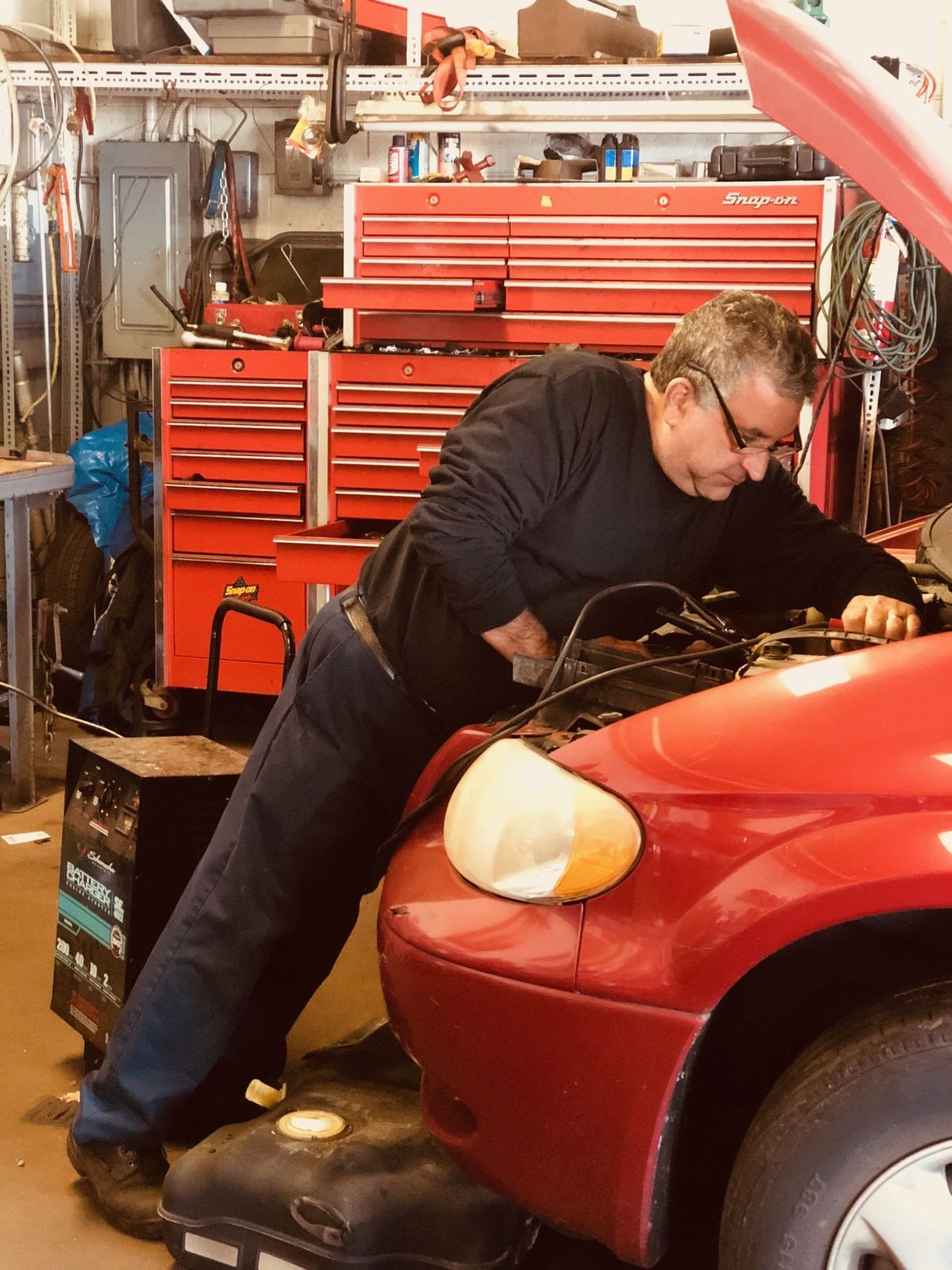 Auto Repair Shop—Middle age veteran mechanic in Fraser, MI