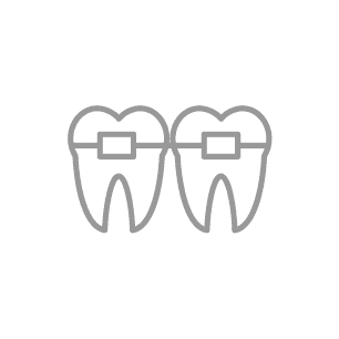 two teeth with brackets