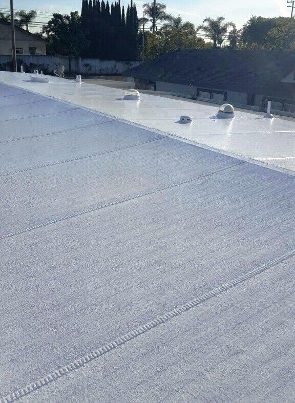 Roofing — Commercial Roof With Air Vents in Upland, CA