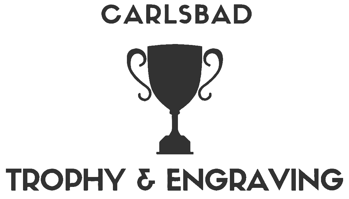 Logo for Carlsbad Trophy & Engraving featuring a trophy icon and the company name.