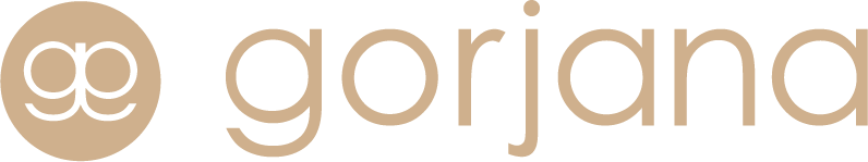Gorjana logo with a double-g symbol in a circle, followed by the brand name in a serif font, all in gold.