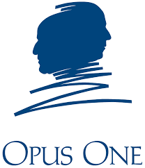 Blue logo: two overlapping face silhouettes, above stylized text "Opus One".