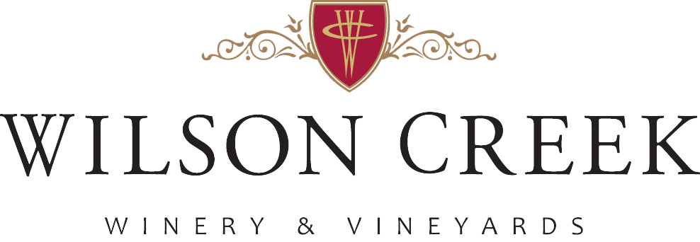 Wilson Creek Winery logo with a red crest and the words "Winery & Vineyards".