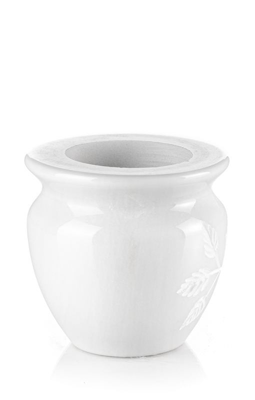 Un vaso bianco con un buco al centro su uno sfondo bianco.