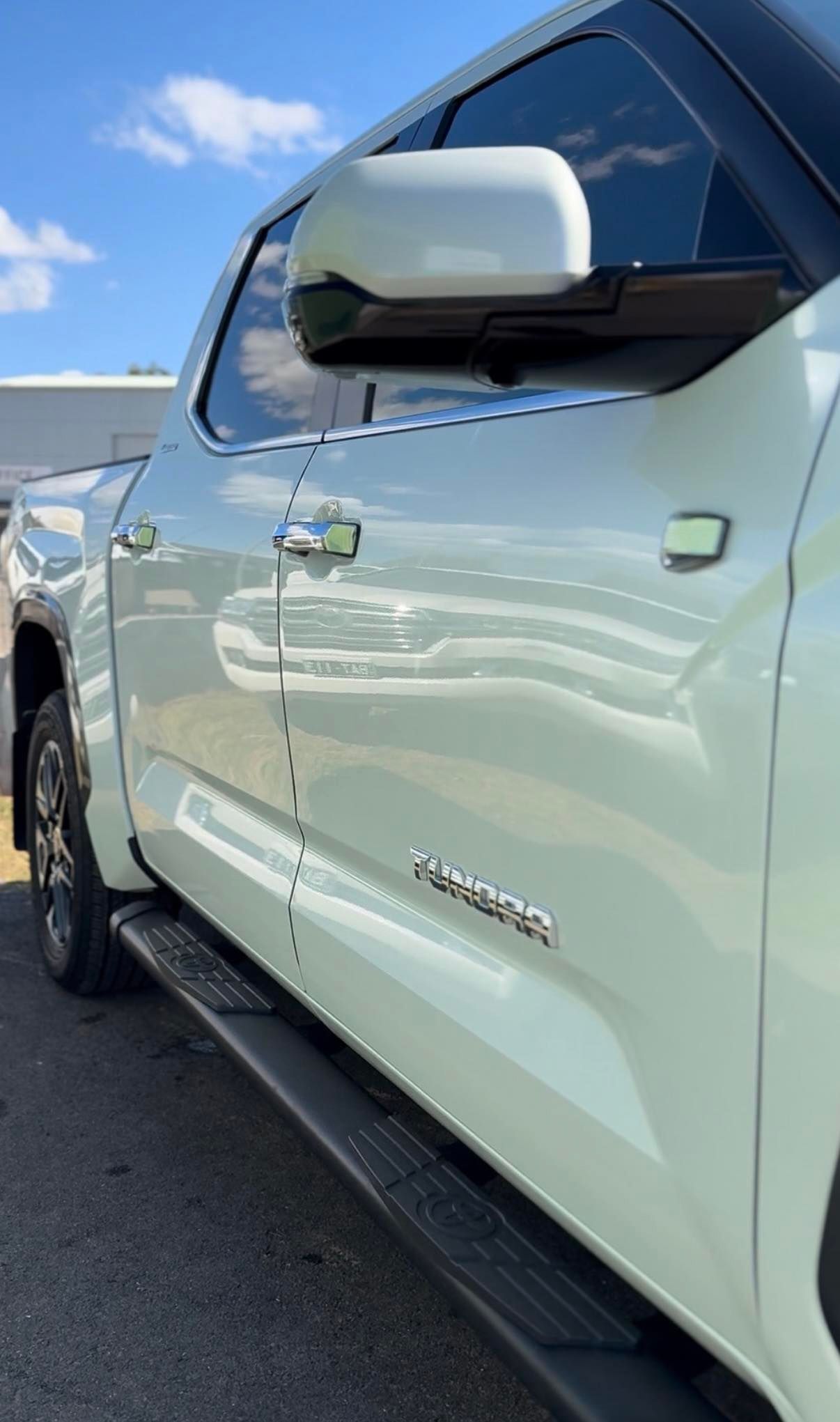 White Pickup Truck Side View with Chrome Trim — Beclean Auto Detailing in Mareeba, QLD