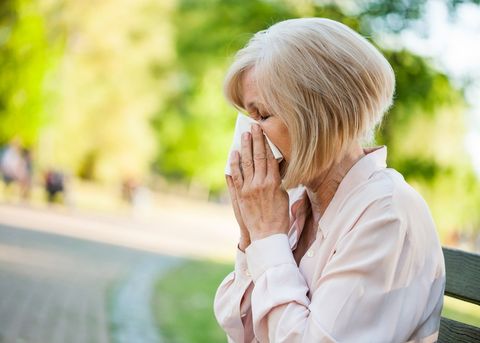Woman Sneezing — Hickory, NC — Hickory Allergy and Asthma Clinic PA