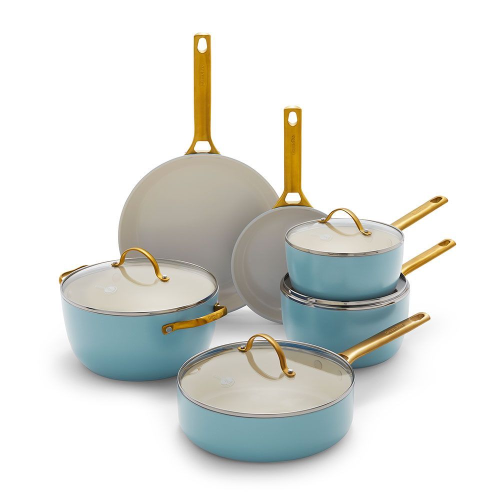 A set of blue Green Pan pots and pans with gold handles