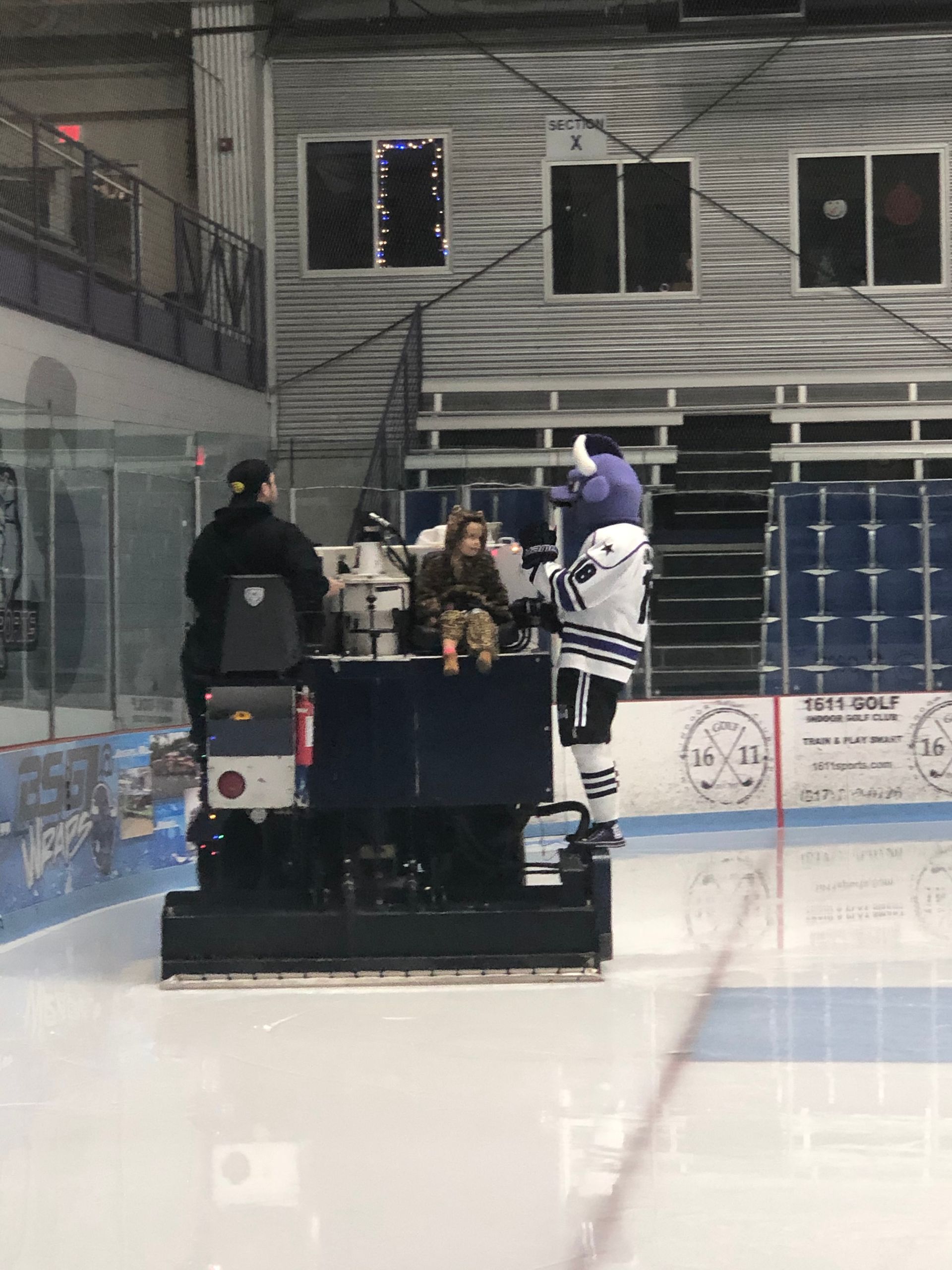 Girl Riding On A Hockey Machine — Haslet, TX — Black Tie Roofing