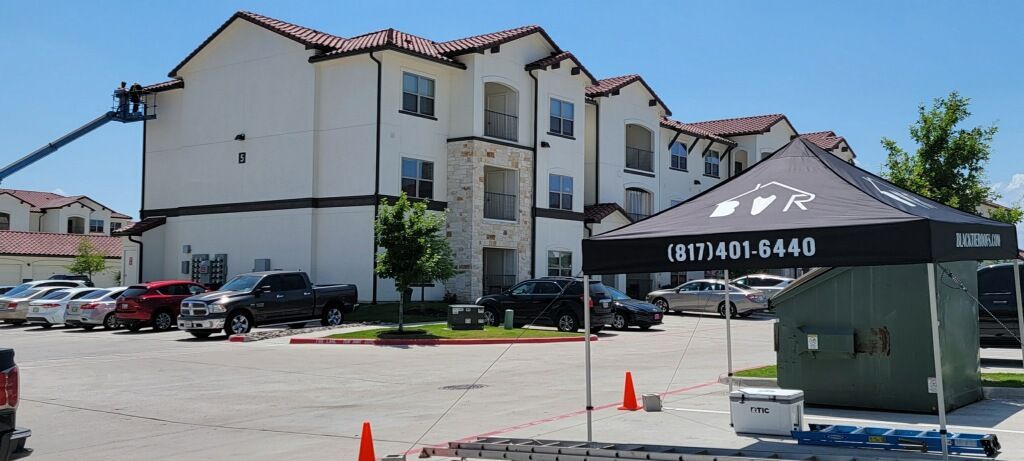 Team Doing Roof Job On An Apartment — Haslet, TX — Black Tie Roofing