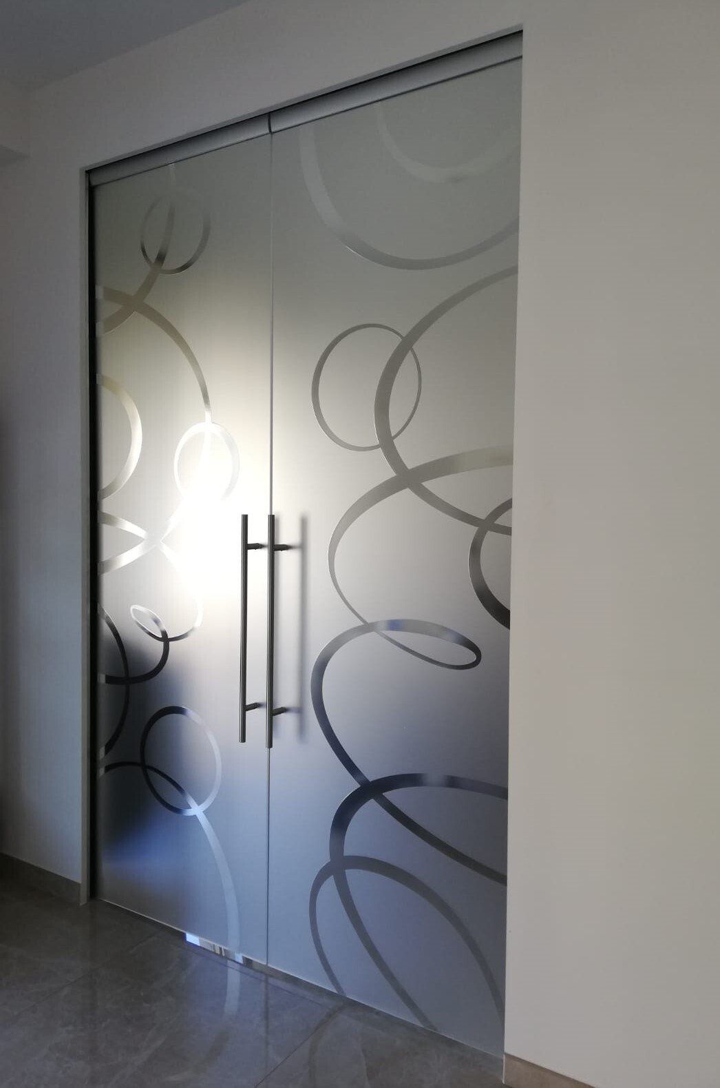 Porta in vetro a battente