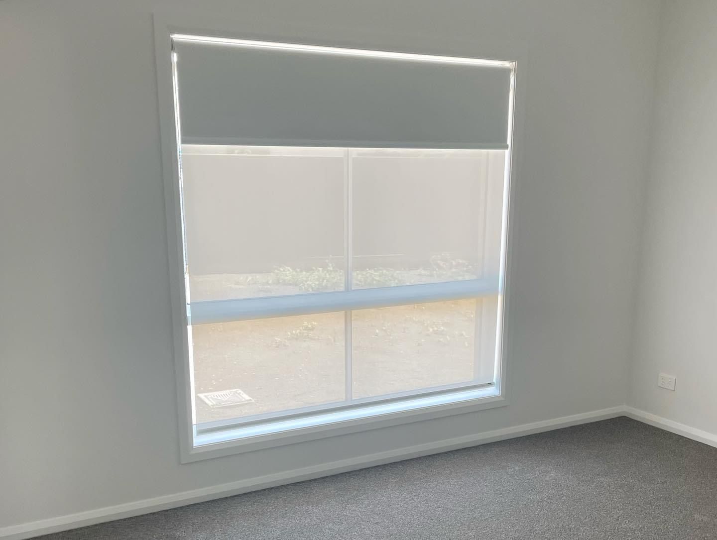 There is a large window in the middle of the room.
