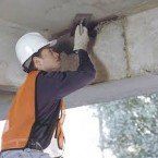 Construction Worker Applying Cement | Chicago, IL | Turek & Sons