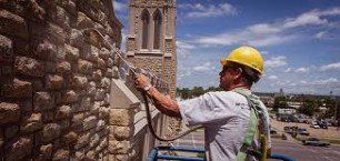 Worker Building Masonry Wall | Chicago, IL | Turek & Sons