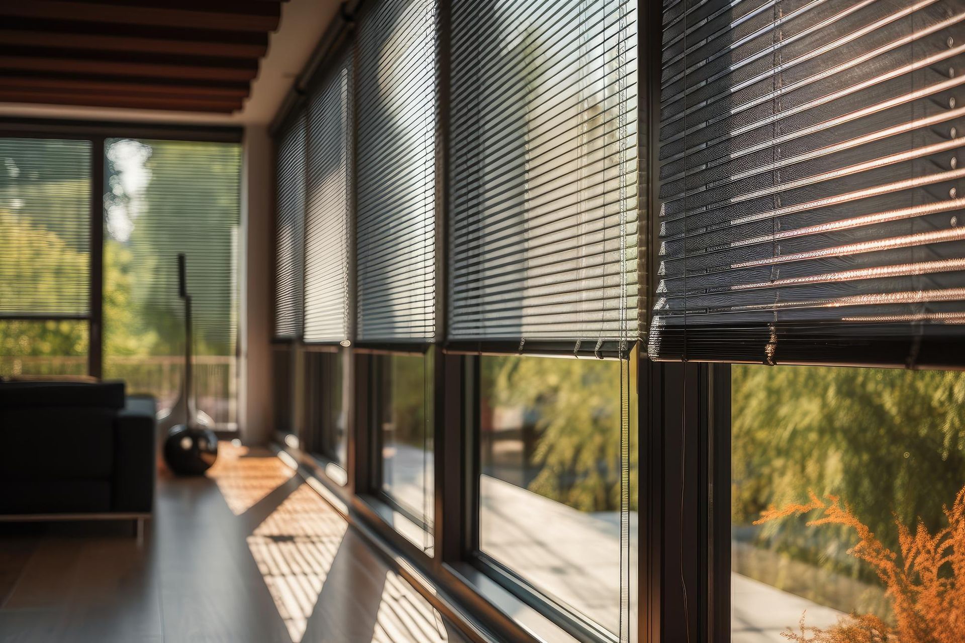 A living room with windows and blinds.