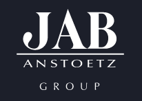 A logo for jab anstoetz group on a dark blue background