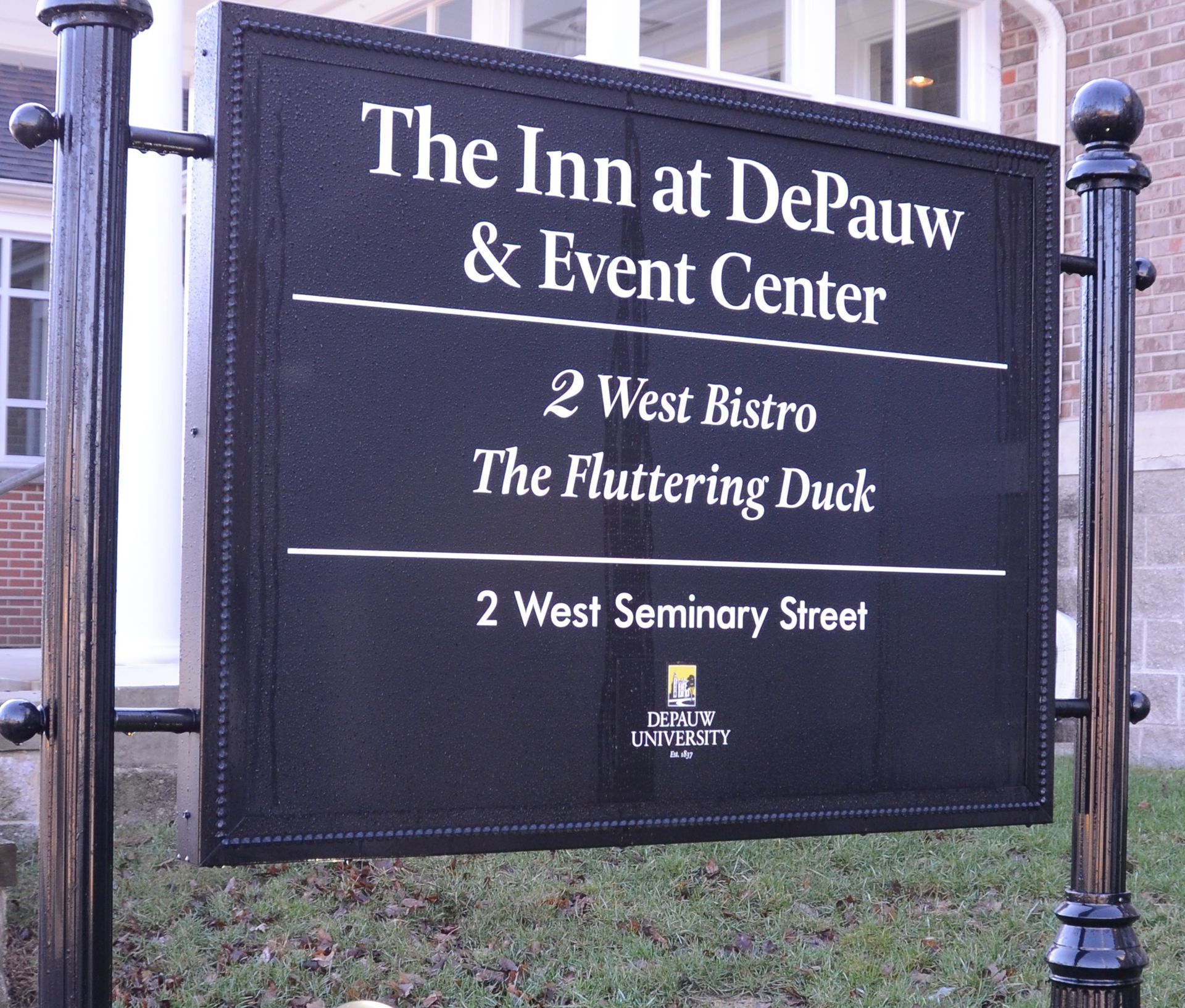 A sign for the inn at depauw and event center