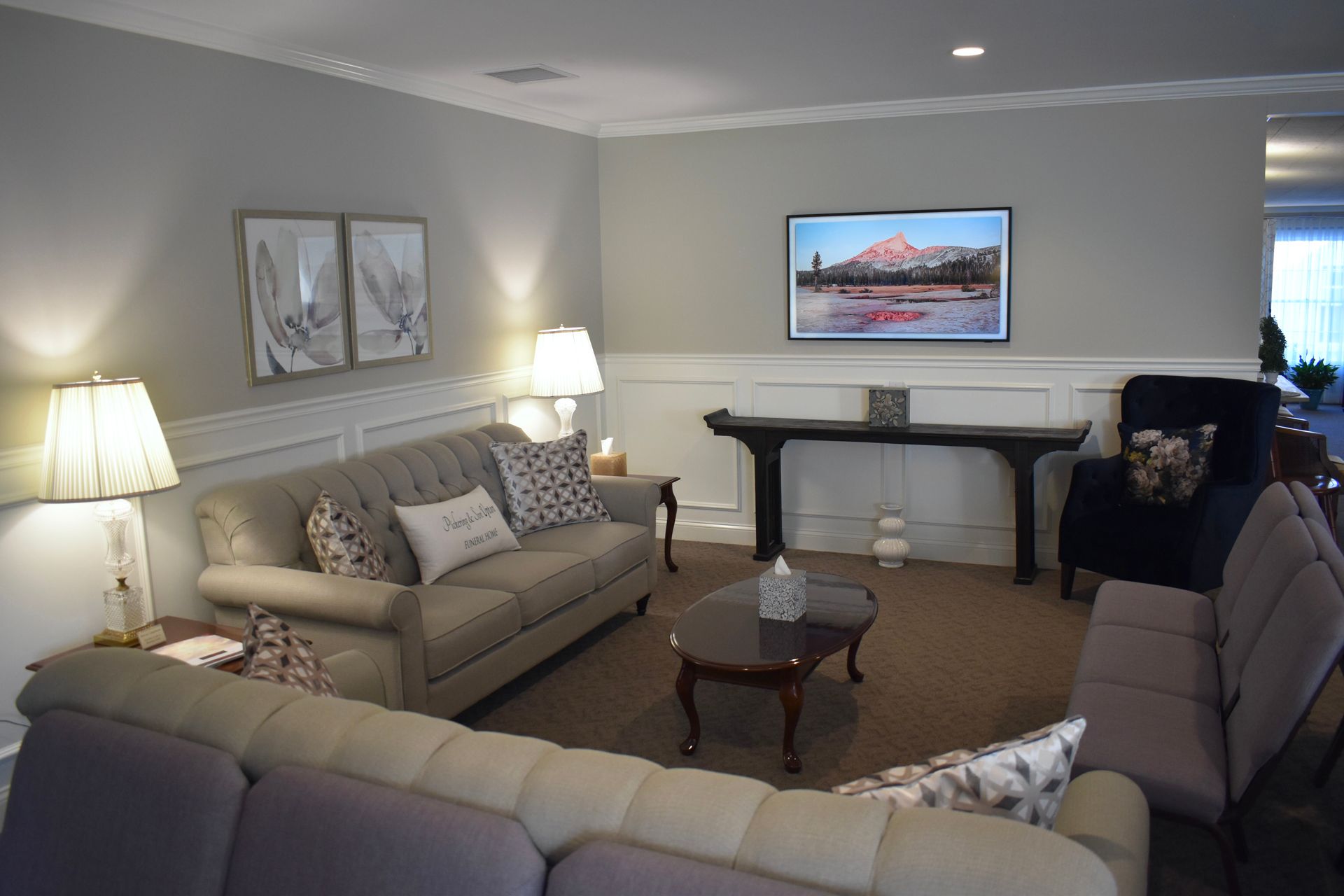 A living room filled with furniture and a flat screen tv