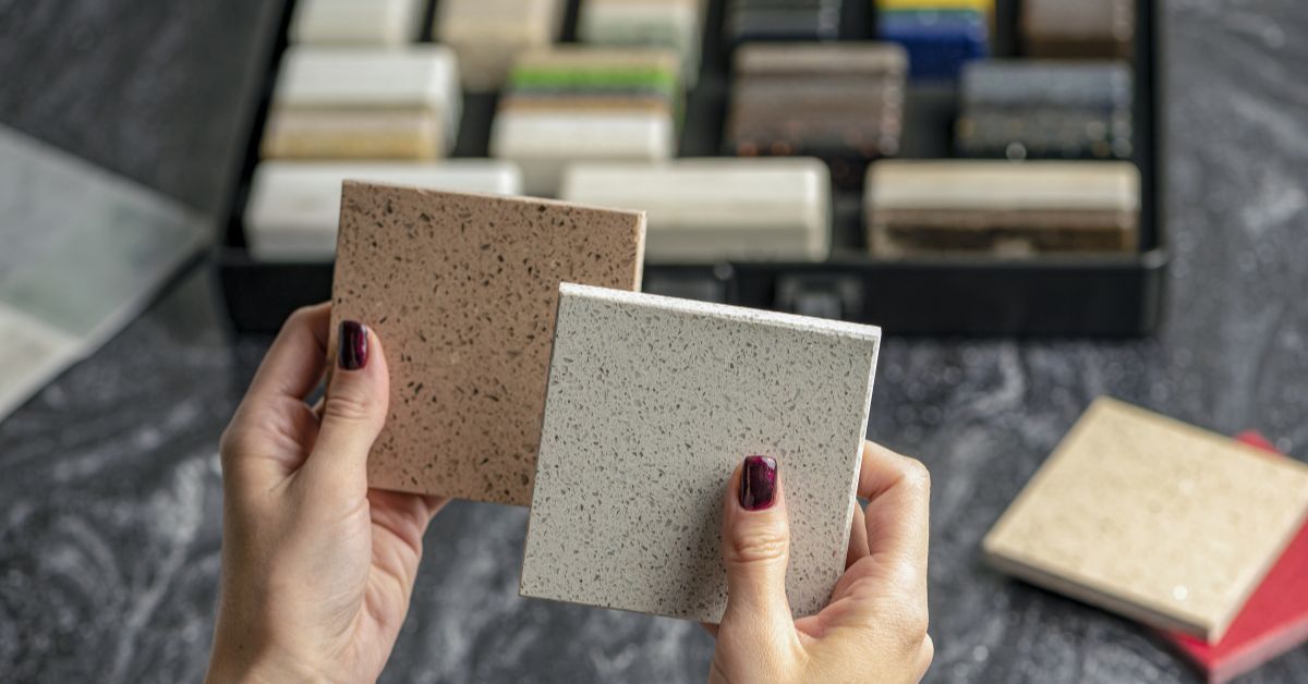 a woman choosing granite slabs for her kitchen countertop