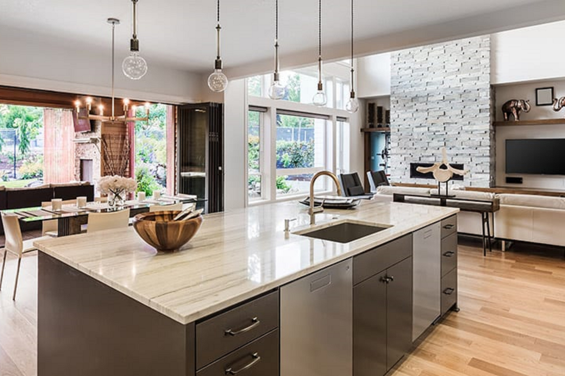There is a large island in the middle of the kitchen.