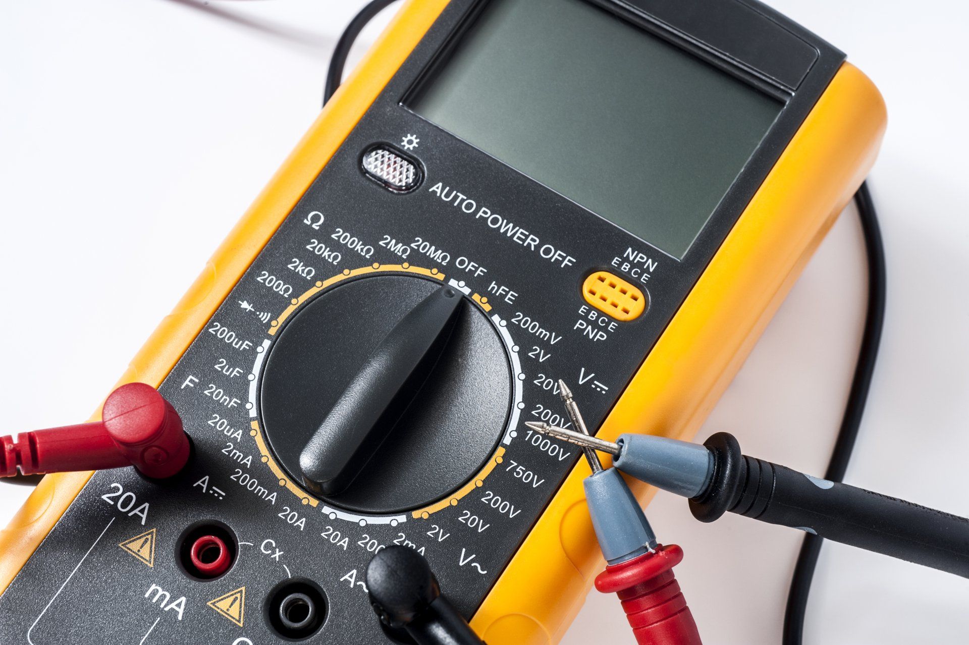 A digital multimeter with two probes attached to it