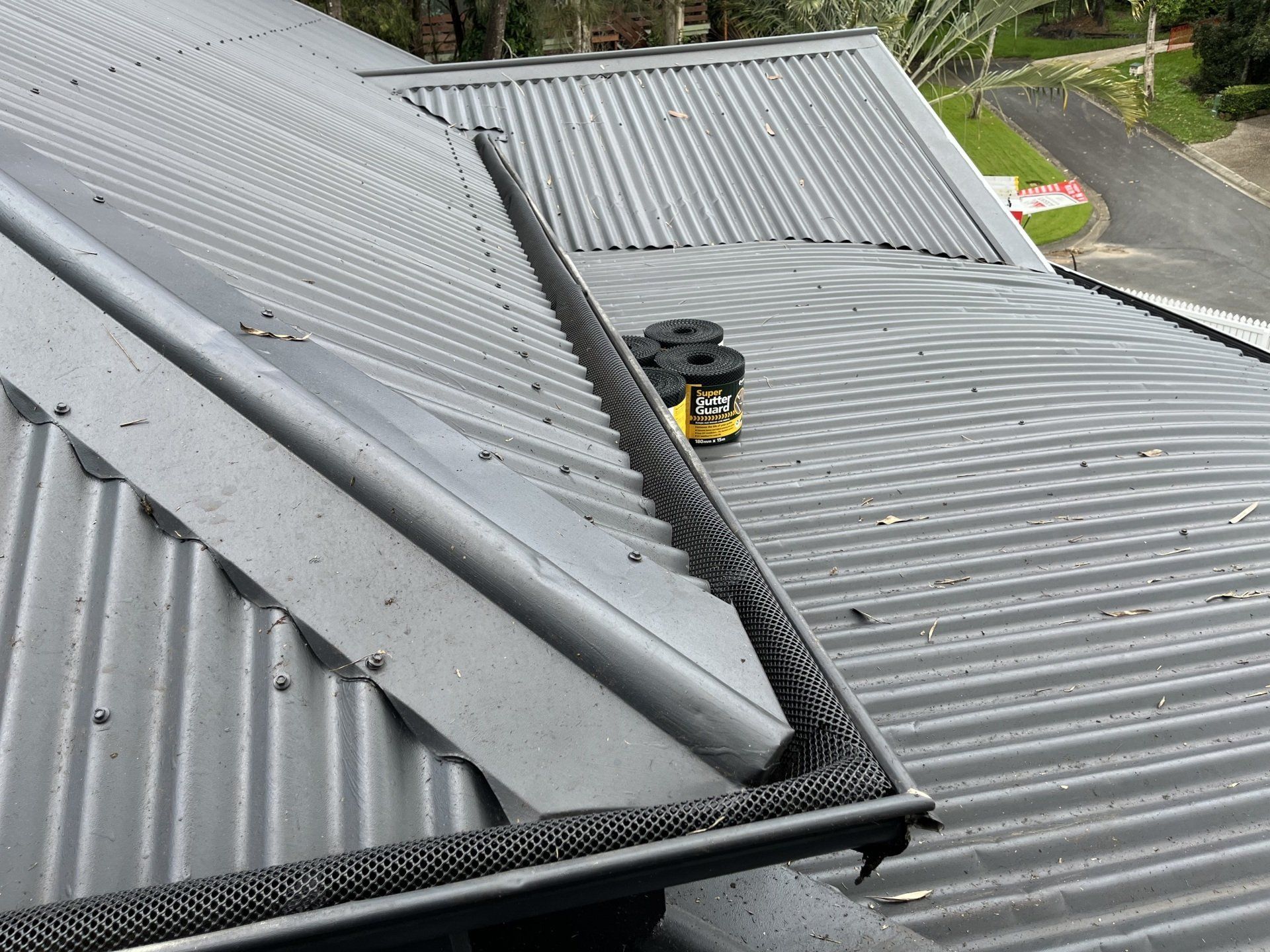 Gutter Being Cleaned — Jackson’s Window Cleaning in Nerang, QLD