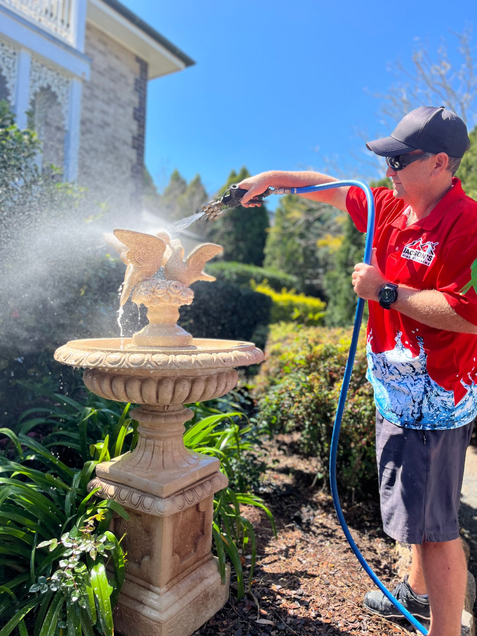 Soft Washing a Bird Bath — Jackson’s Window Cleaning in Nerang, QLD