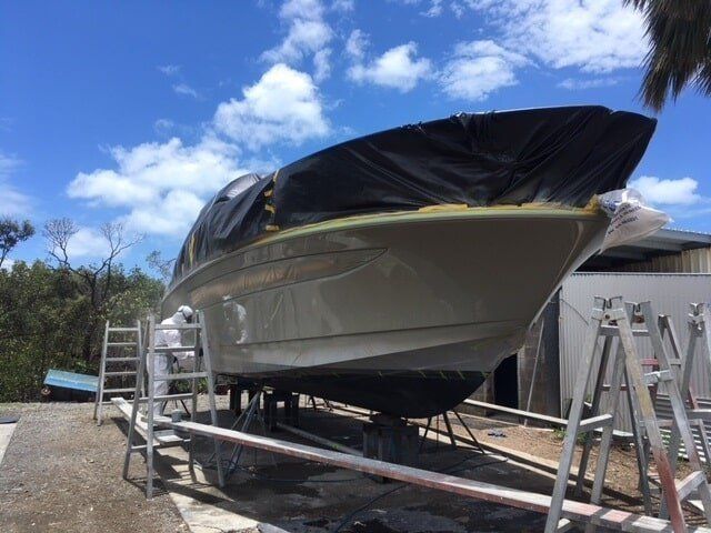 A Boat Is Sitting On A Trailer With A Ladder In Front Of It — Edge's Boatyard In Jubilee Pocket, QLD
