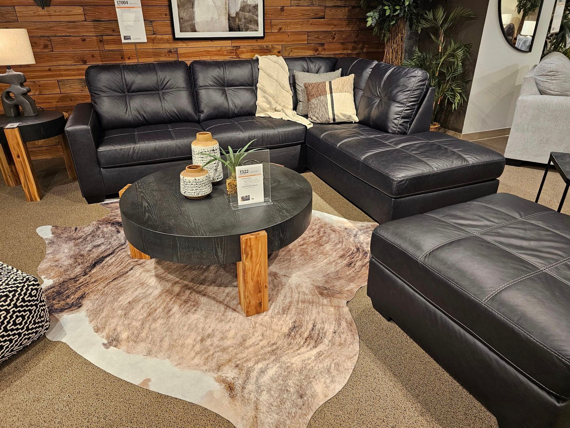 A white dining table and chairs are sitting on a rug in a dining room - Montclair, CA - Alexa Furniture