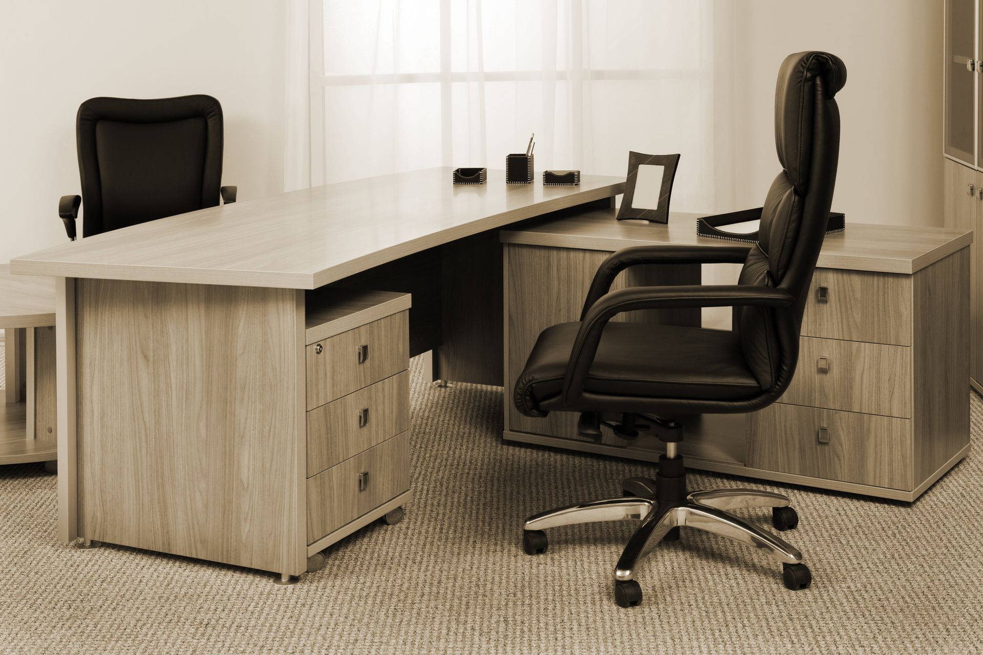A blue couch with pillows on it is in a living room - Montclair, CA - Alexa Furniture