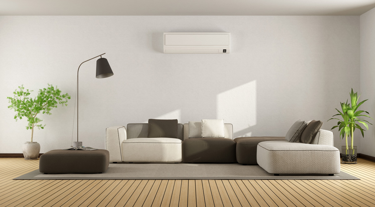 Living Room With And Air Conditioner — Woree, QLD — Air First Air Conditioning and Electrical