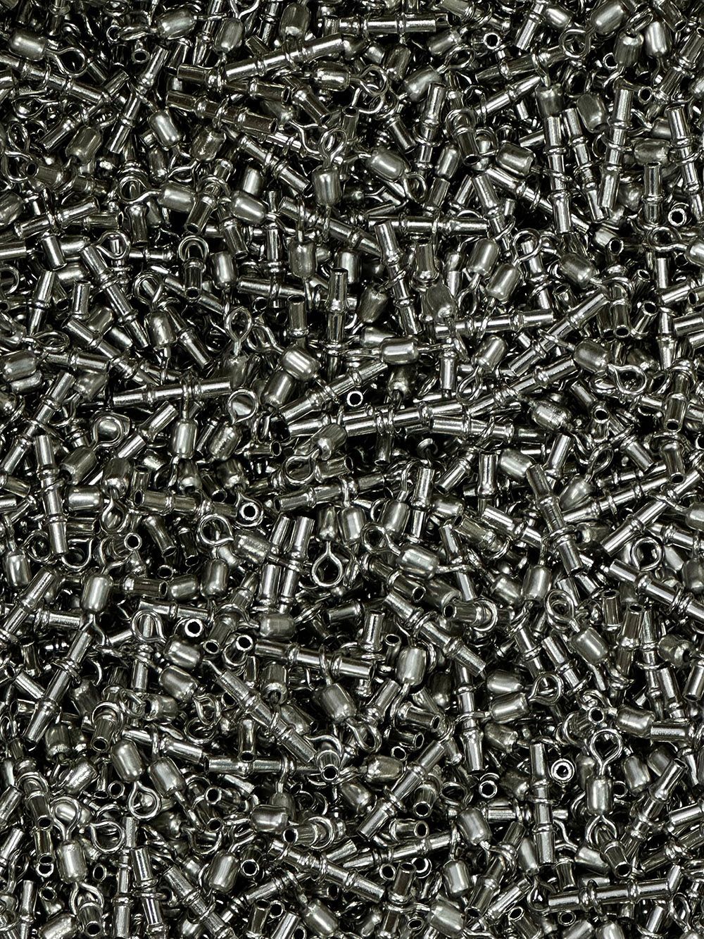 Bright nickel-plated brass fishing swivels by Seminole Metal Finishing.