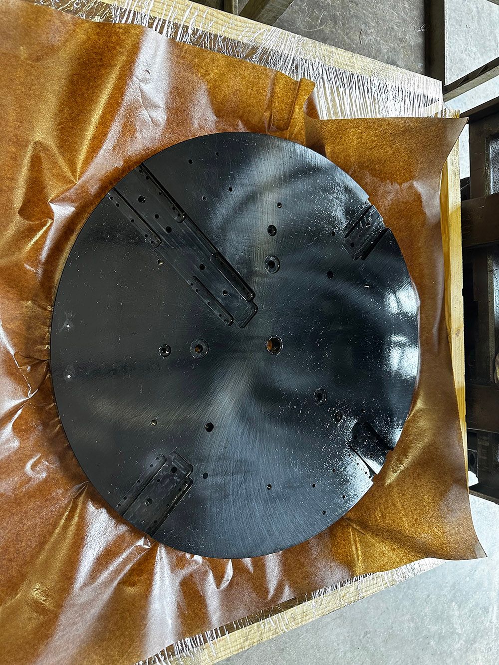 Black oxide on a large steel plate by Seminole Metal Finishing.