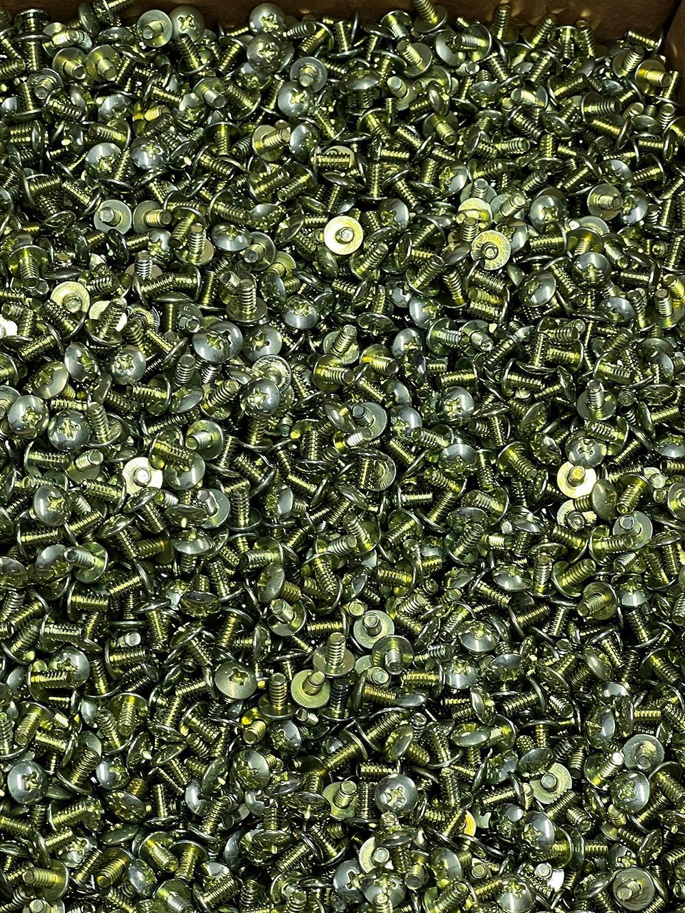 Yellow zinc plated screws by Seminole Metal Finishing.