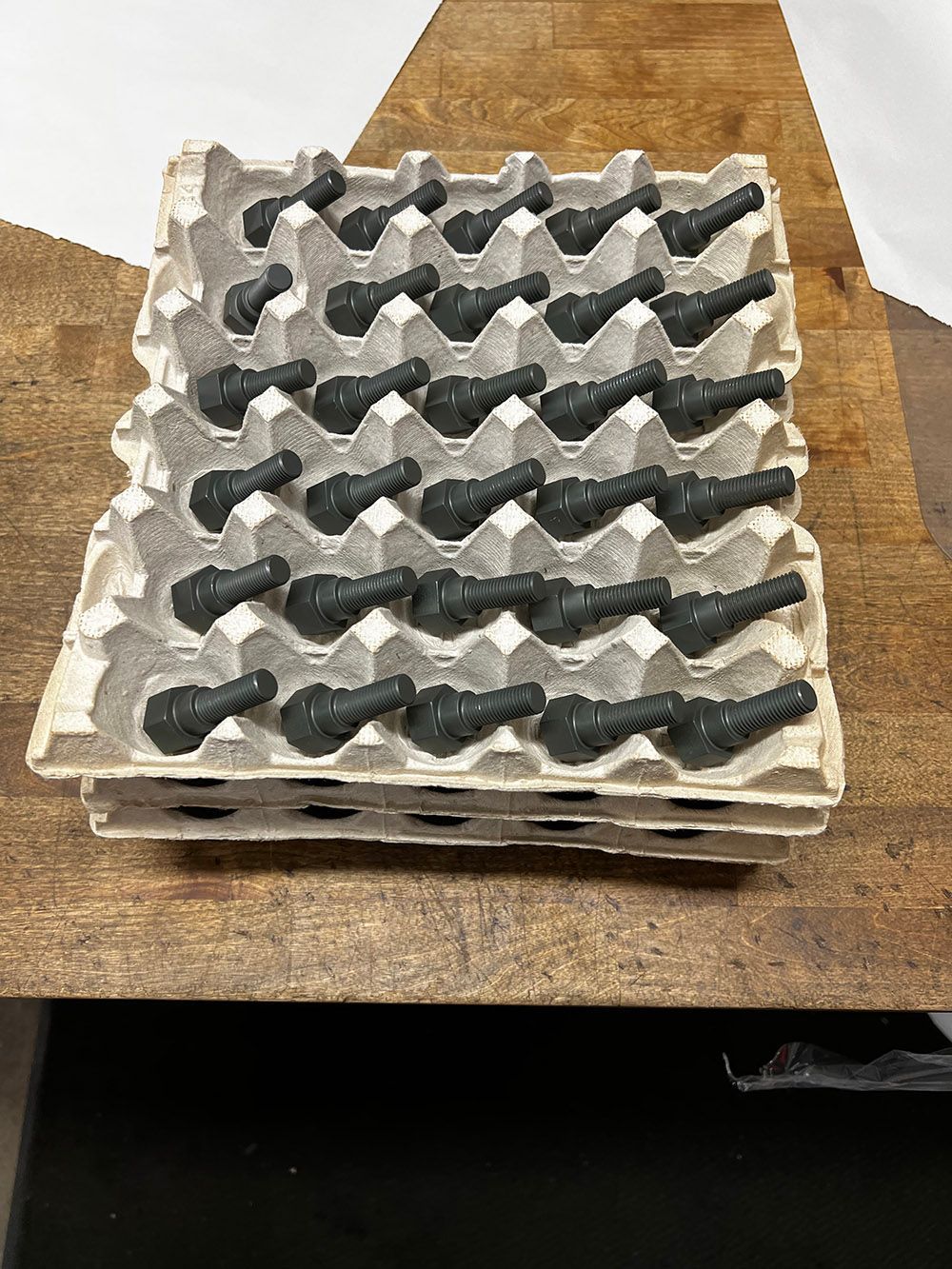 Dry film lubricant on bolts by Seminole Metal Finishing.