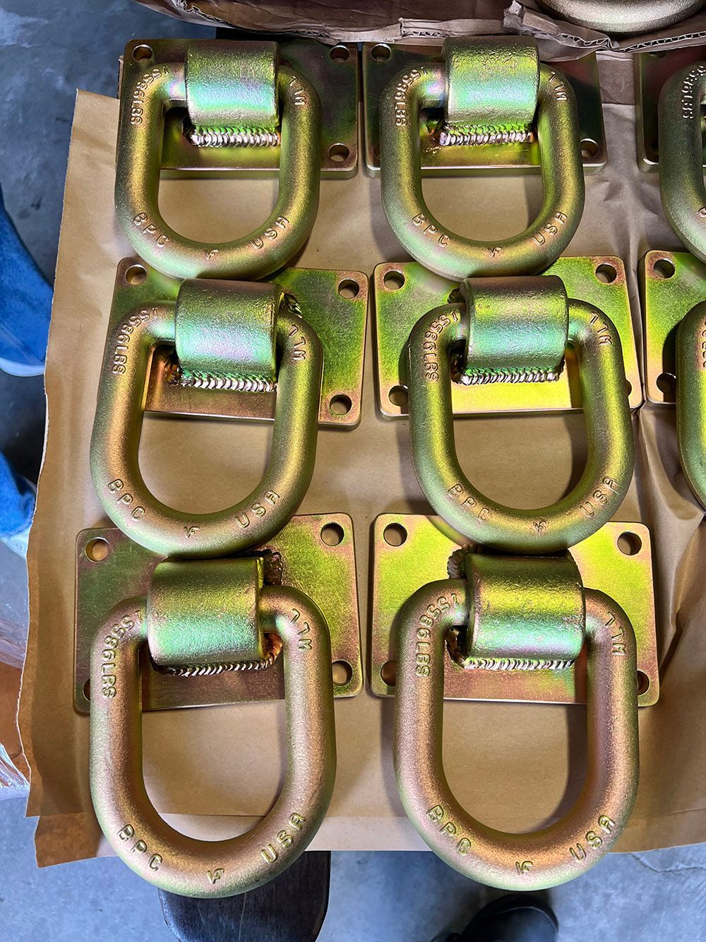 Yellow zinc plated heavy duty lifting rings by Seminole Metal Finishing.