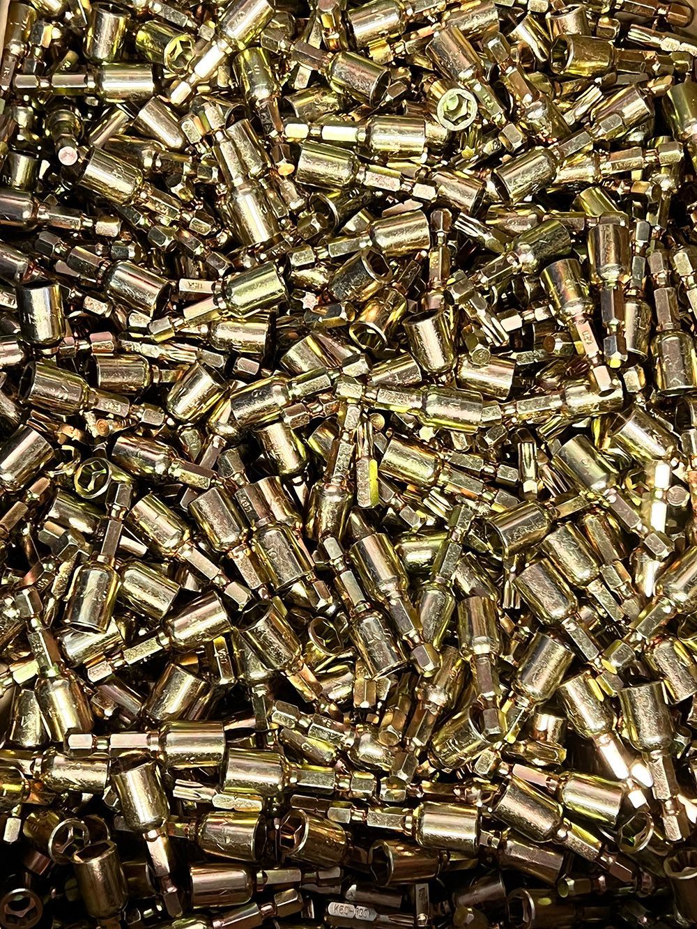 Yellow zinc plated driver bits by Seminole Metal Finishing.