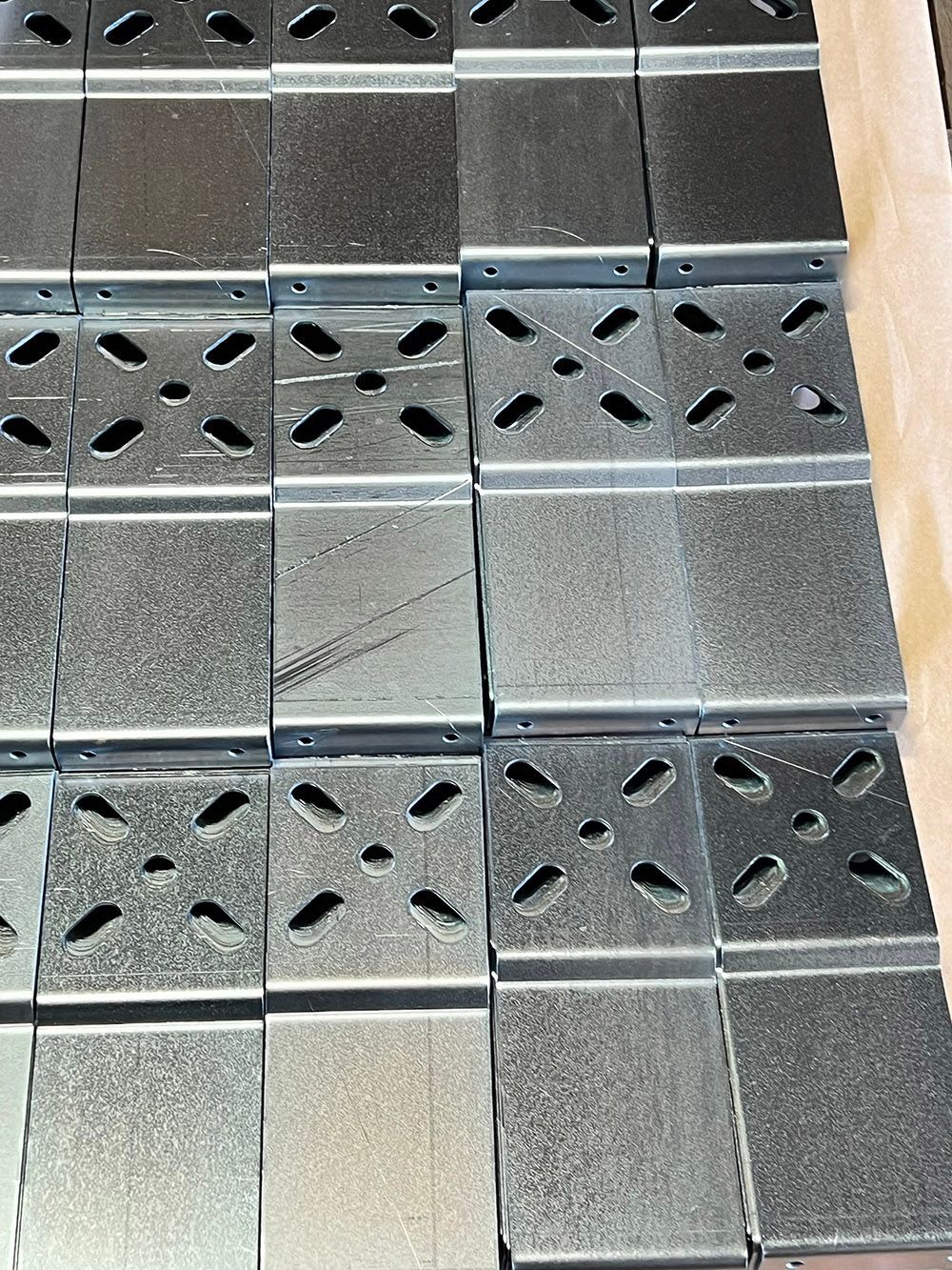 Clear zinc plated steel stamped parts by Seminole Metal Finishing.