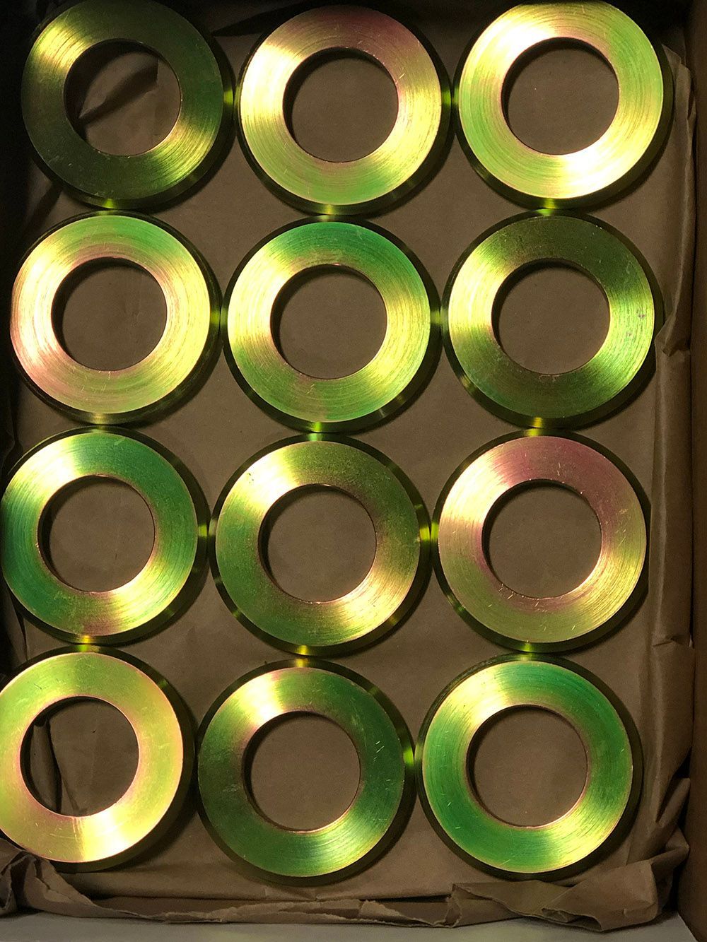 Yellow zinc plated washers by Seminole Metal Finishing.  