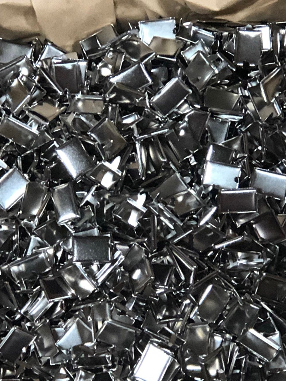 Steel decorative rivets plated with bright nickel by Seminole Metal Finishing.  