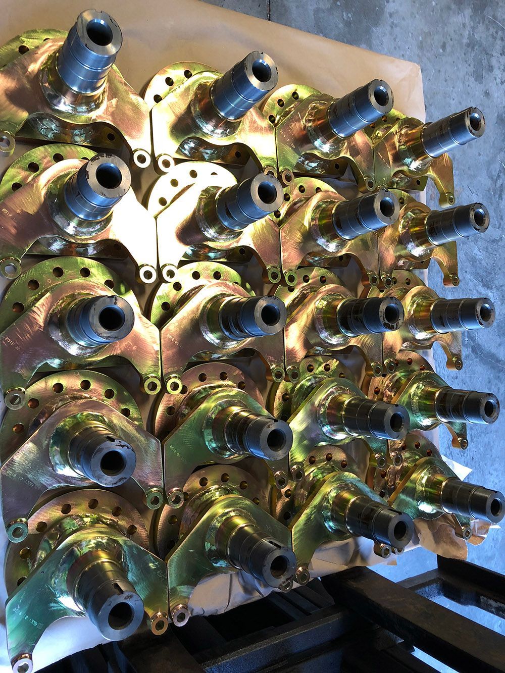 Yellow zinc plated steel hubs that were selectively plated by Seminole Metal Finishing.