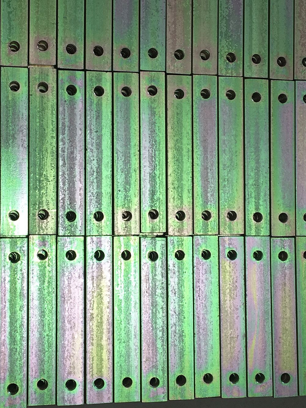 Yellow zinc HRS steel bars by Seminole Metal Finishing.