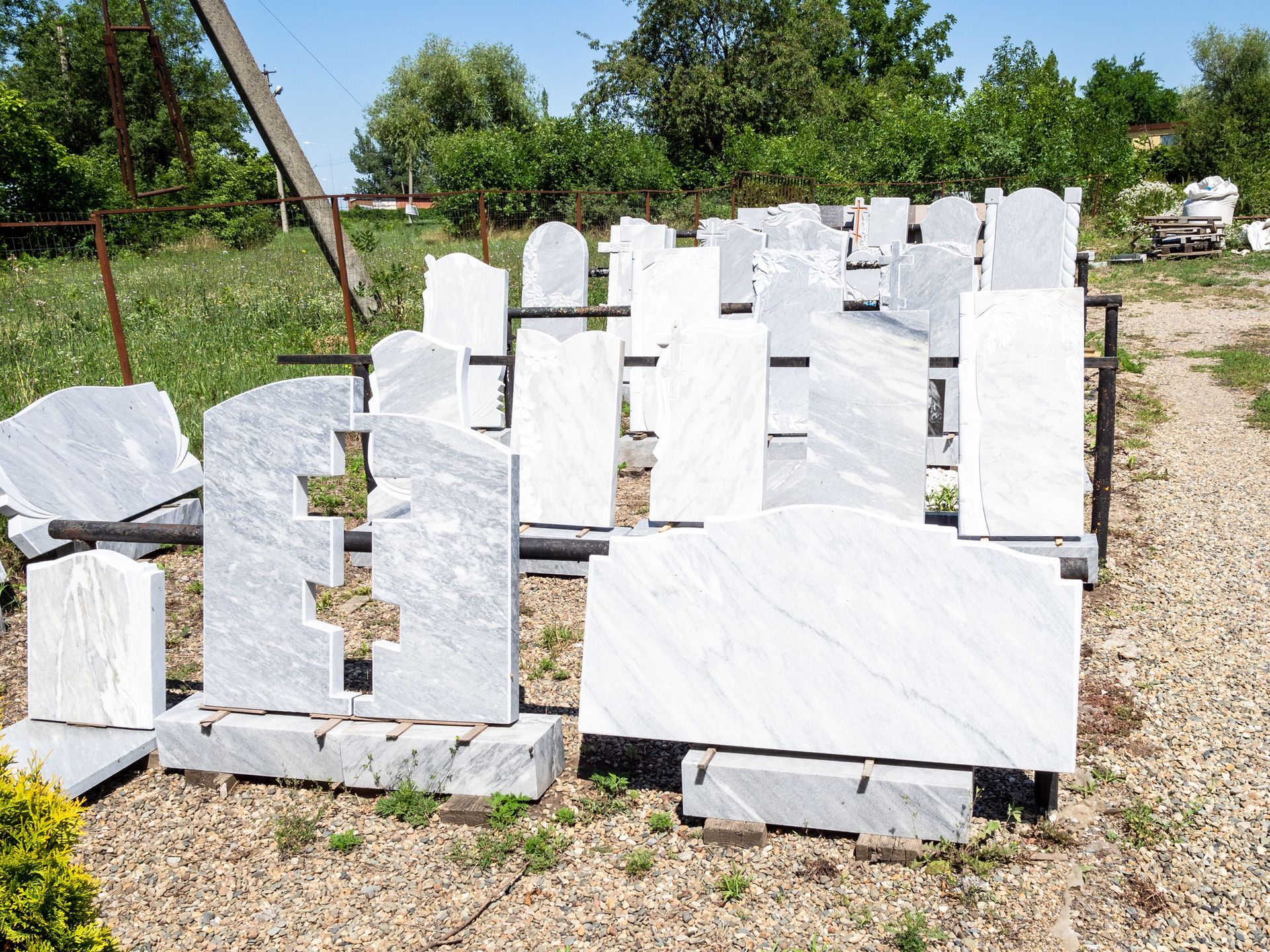 A cemetery with a lot of graves in it