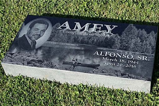 A cemetery with a lot of graves and a sunset in the background