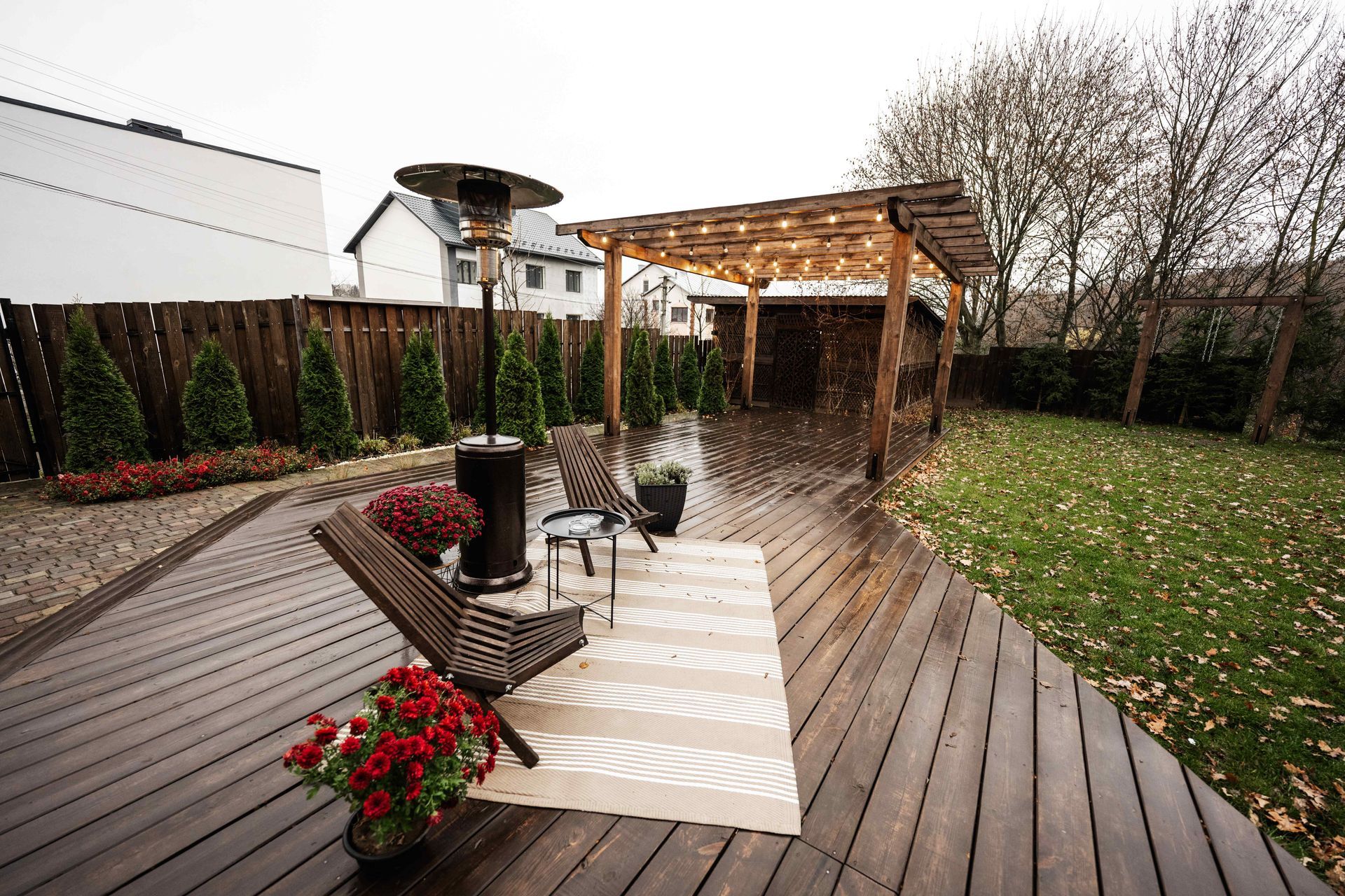 Backyard wooden patio with pergola