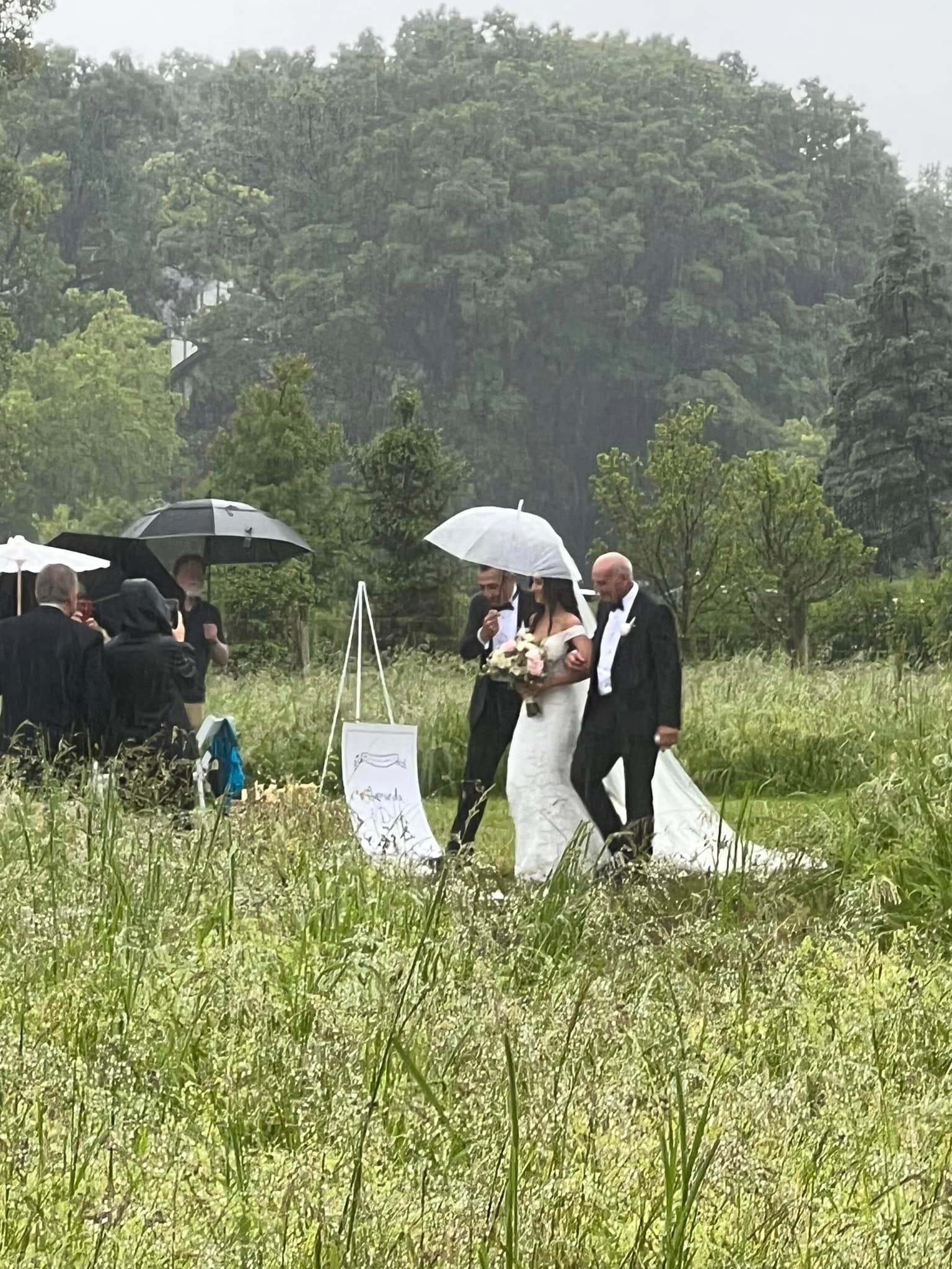 Amanda and Dylan Matthews by Fifi’s Bridal A Rainy Wedding Day 2024